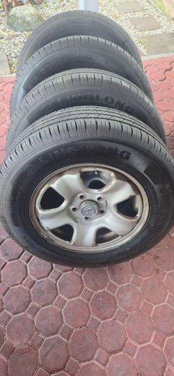 Honda CRV rims and tires .