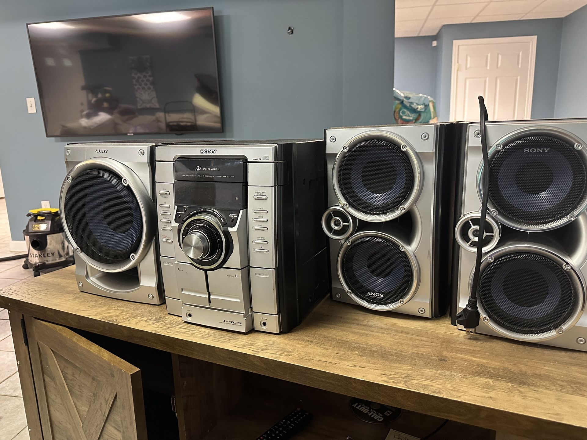 Sony Mini Hi-Fi Component System, including: • The main unit (CD, cassette, tuner, MP3 playback) • Three matching Sony speakers: two main