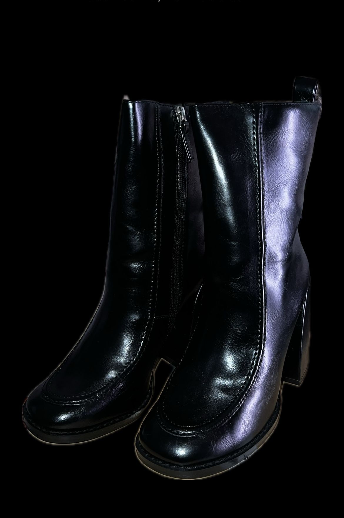 Black Leather Ankle Boots With A Retro Vibe