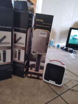 Portable Heaters with Remotes and paperwork