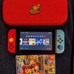 Nintendo switch + Mario kart delux + carry case