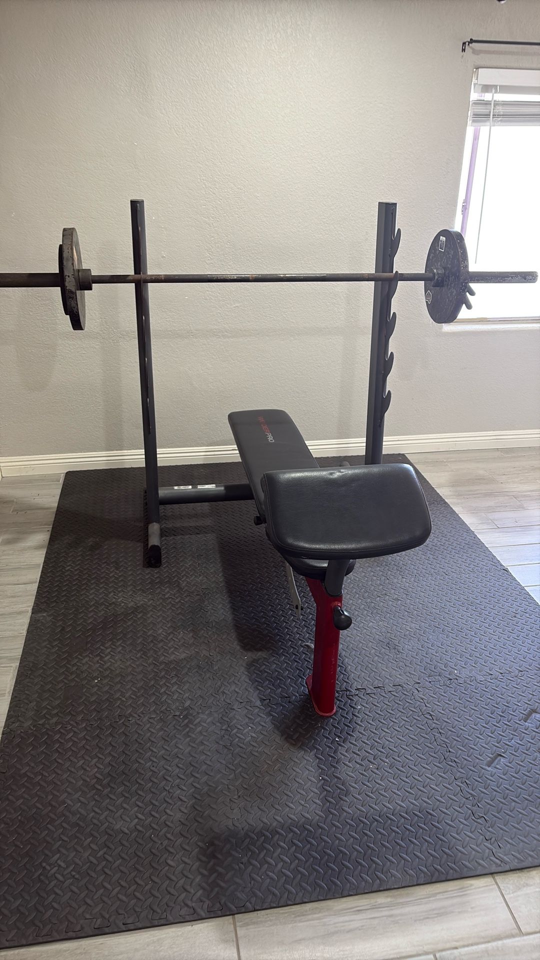 Weight Bench with olympic Bar and weights ( Weider Pro)