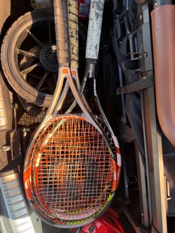2 Wilson tennis rackets / and 1 Babolat Roland racket