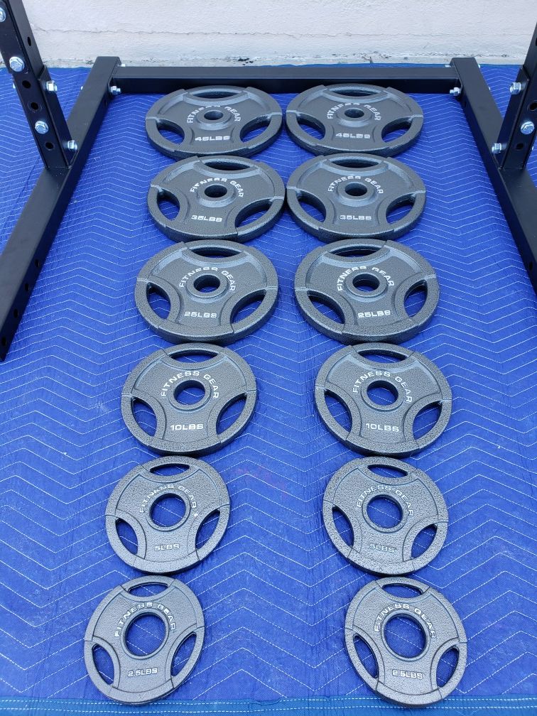 COMPLETE OLYMPIC WEIGHT SET. SQUAT RACK/BENCH PRESS, ADJUSTABLE BENCH