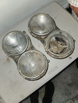 1958 impala original headlight buckets