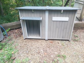 NEVER USED  WEATHERPROOF DOG HOUSE-$150 OBO