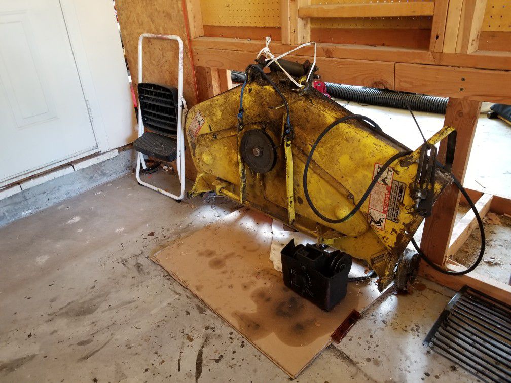 317 John Deere Garden Tractor. Good condition low hours. 3 attachment. 48" lawn mower deck. Rototiller blade. 60" snowblower blade. All hydraulic