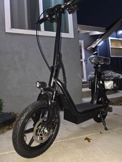 Electric Scooter With Seat
