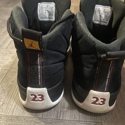 Air jordon’s 12 black/gold us .9.5