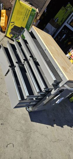 HUSKY 46"IN WORKBENCH CABINET 9 DRAWERS  NEW HAS SMALL DENT