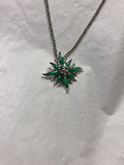 Green and silver sun necklace