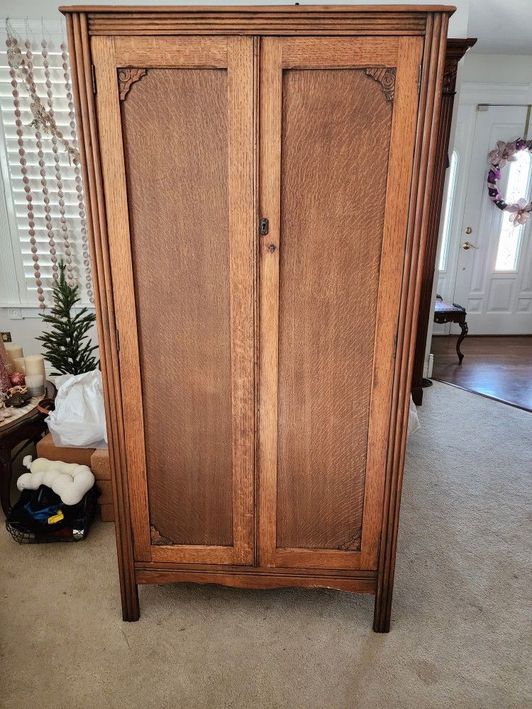 Antique armoire with shelving.