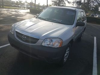 2400 cash. 2001 mazda tribute titulo limpio