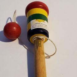 Red. Yellow, Green, Black Wood Game Of Skill With Ball