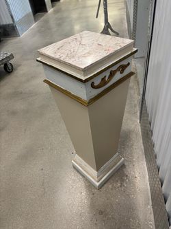 Pink Marble top pedestal. 12” x 12” , 37” high $75