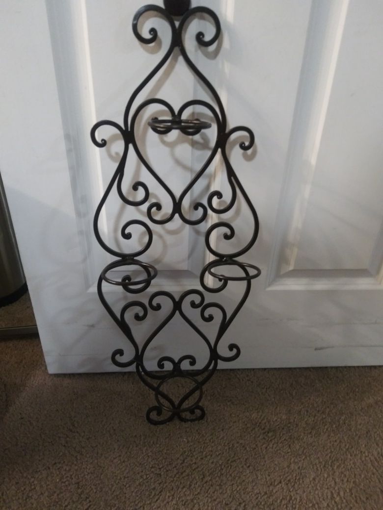 ( Wall Hanging Wine Rack.) NEW NEVER USED. LETTING IT GO FOR $35.00 Firm. Purchased New For Much More. Holds Four Bottles Wine . Beautiful.