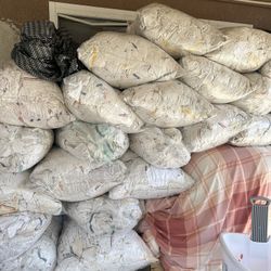 Tengo 13 bolsa tuya blanca para mecánico por $240