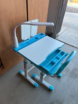 Child’s adjustable desk and chair
