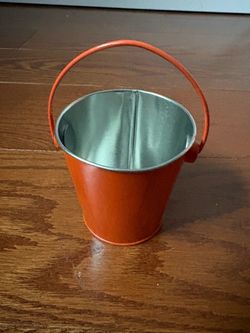 Mini Orange Metal Bucket Pail - Halloween & Fall Decor Add a bright, festive touch to your seasonal decorations with this charming mini orange metal
