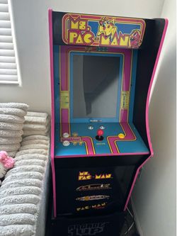 Pac-Man arcade with three other games