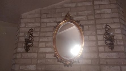 Mirror with lamps