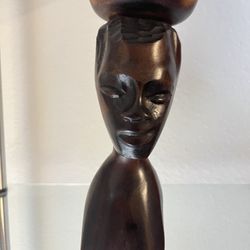 🎨 Hand-Carved African Wooden Sculpture Description: