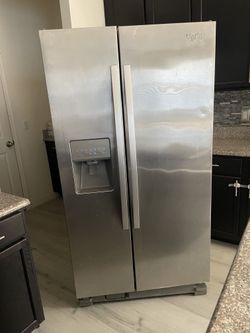 Whirlpool side by side Refrigerator