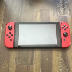 Nintendo Switch with Limited Neon Red Joycons