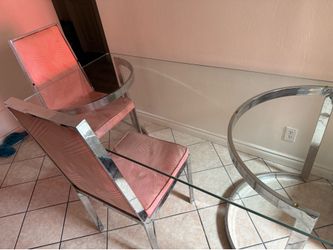 Rectangular glass dining table with chairs