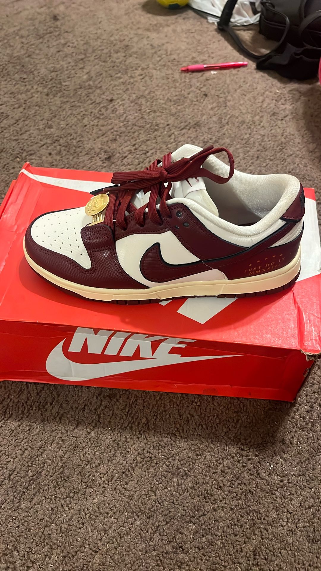 white burgundy and gold dunks 