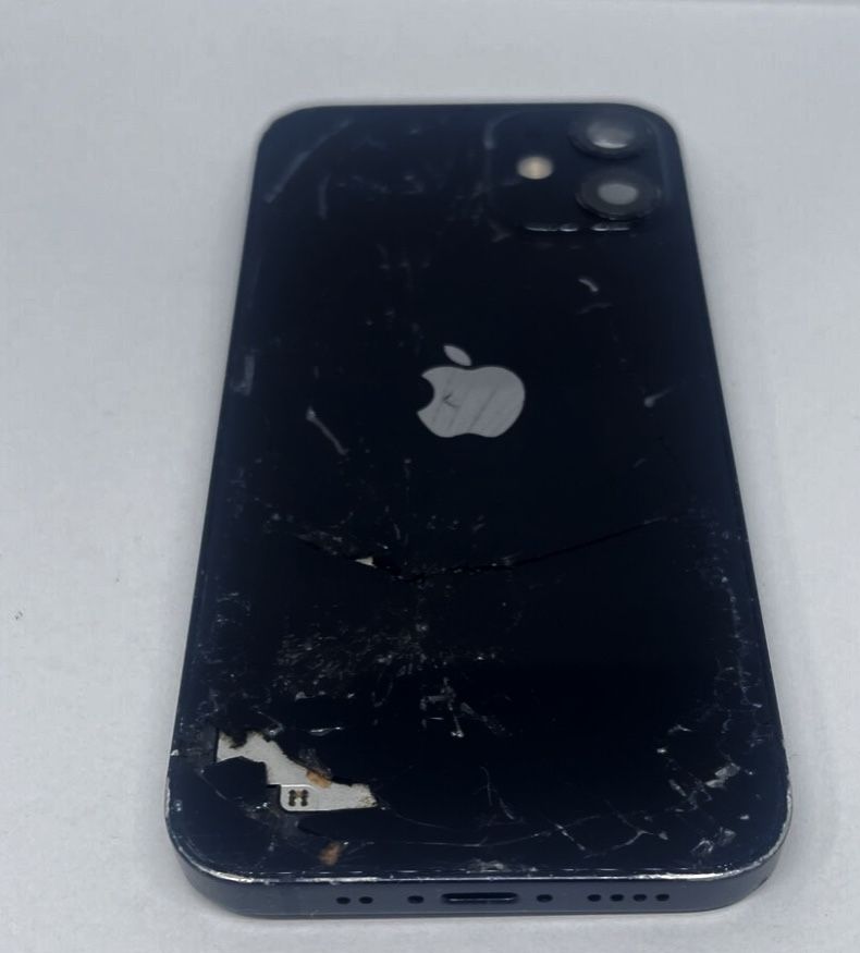 IPhone 12 Mini. With TikTok Installed. Cracked Back. Phone Works Perfectly Fine.