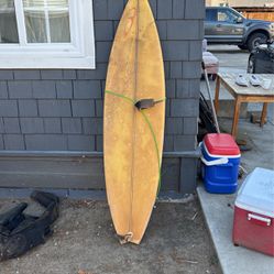 Surfboard With Fins and Leash