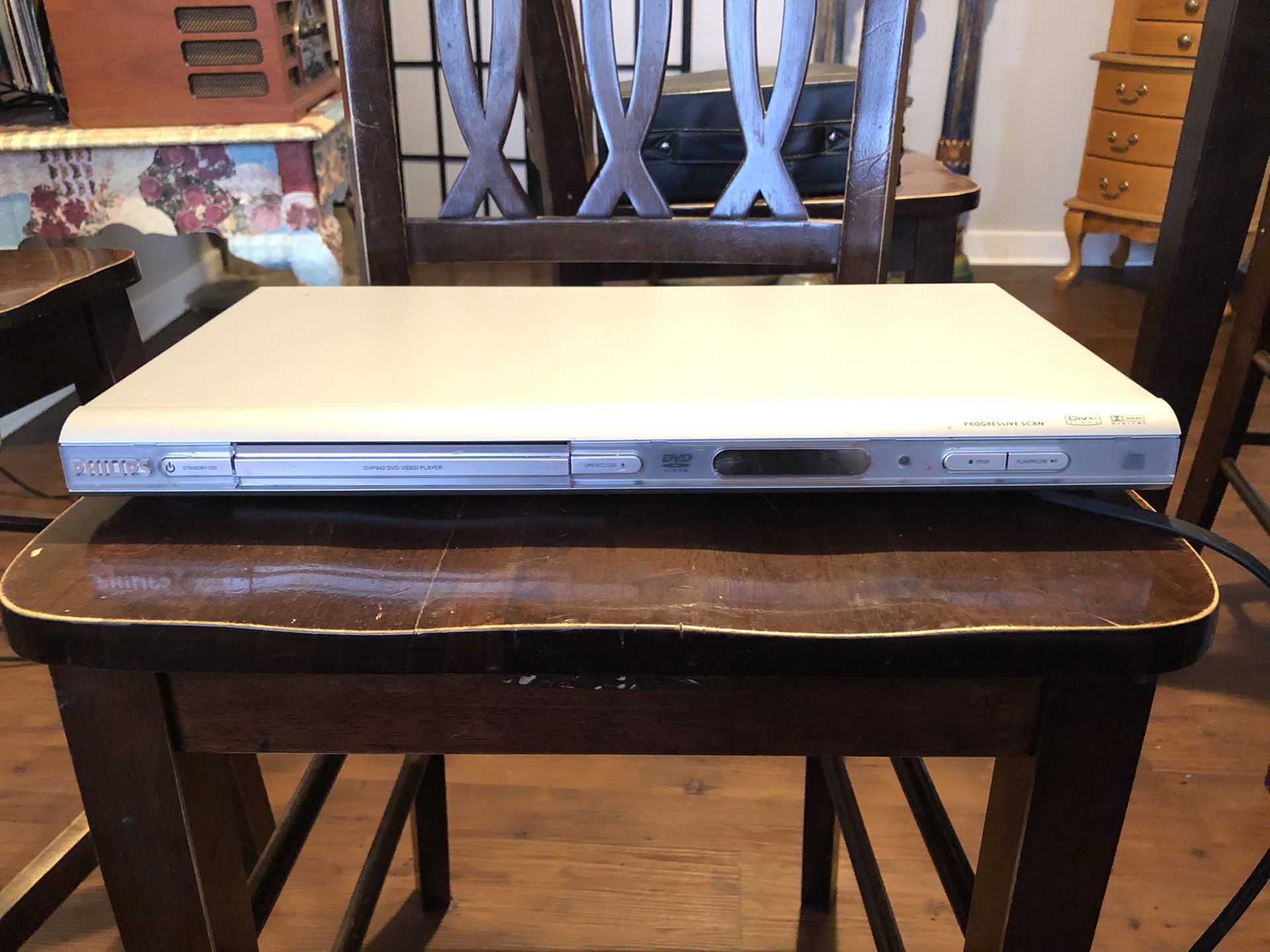 DVD Player with remote and case full of DVDs (about 300)