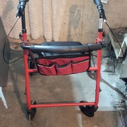 Folding Walker With A Seat