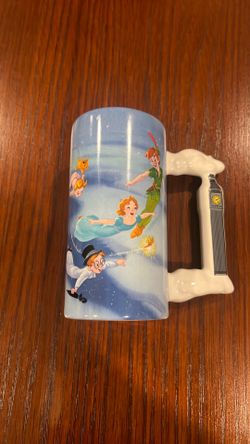 Disney parks Peter Pan Neverland ceramic tall coffee mug with clock tower on handle