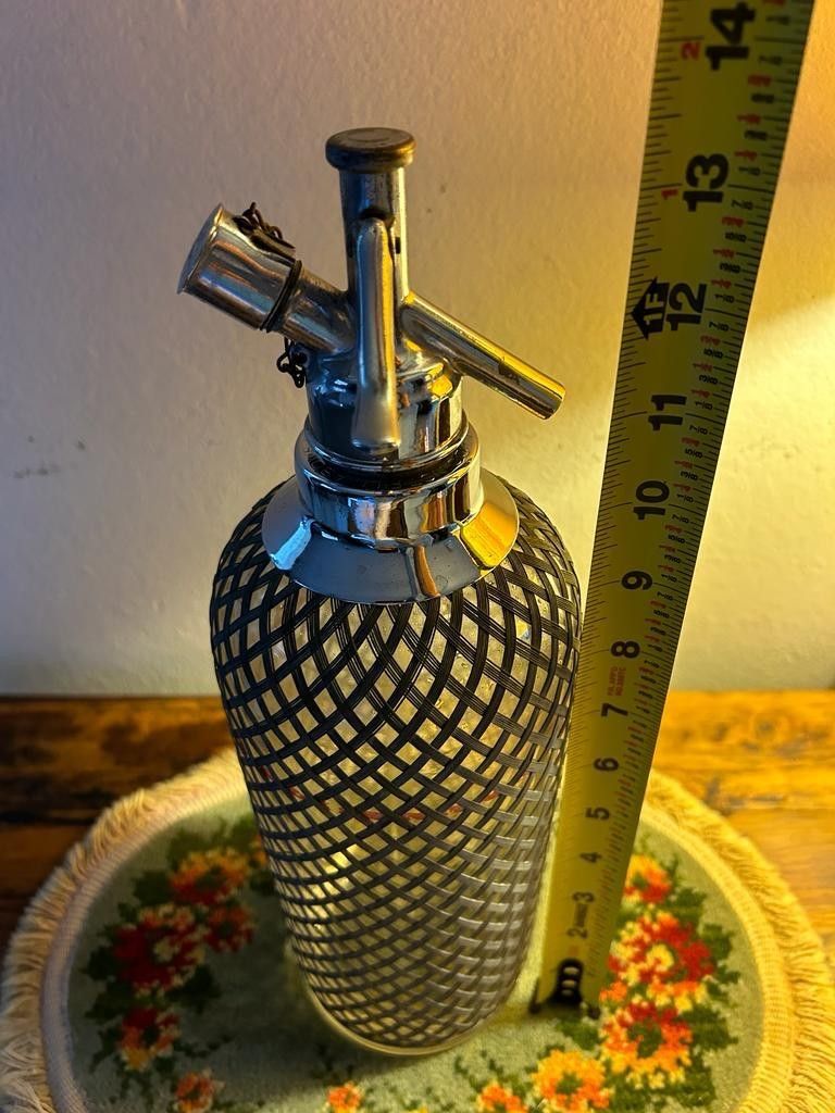 BOTELLA D GASIFICADA DE CRISRAL FORRADA EN MALLA