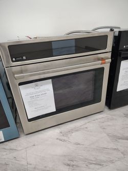 $1159 electric wall oven with convection and steam clean