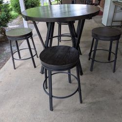 Pub Style Table With 4 Stools