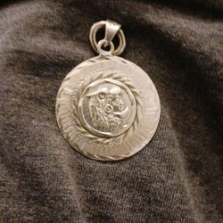 Silver Medallion Necklace Of The Aztec King On One Side And The Aztec Calendar On The Other