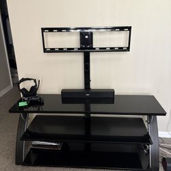 Tv Stand  ( HEADPHONES AND SPEAKER NOT INCLUDED) 