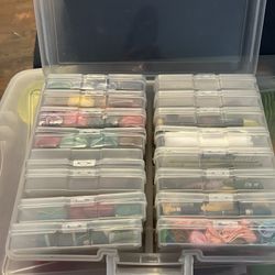 CLEAR CASE WITH 16 SMALL CASES FULL OF DMC THREAD & NEEDLES