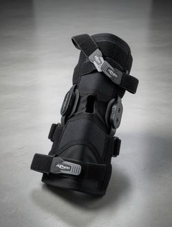 DonJoy Hinged Knee Brace for Stabilization, Adjustable Straps, Black