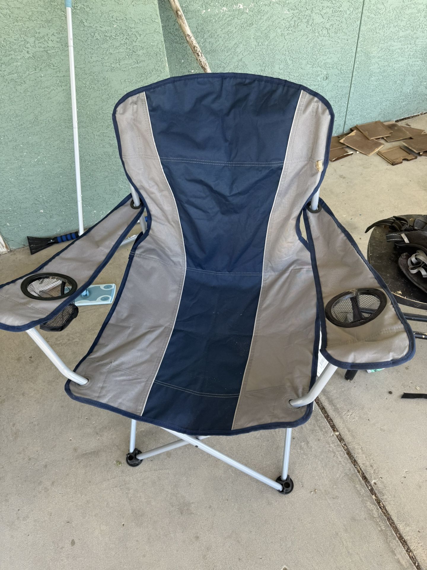 Two Collapsing Lawn Chairs.
