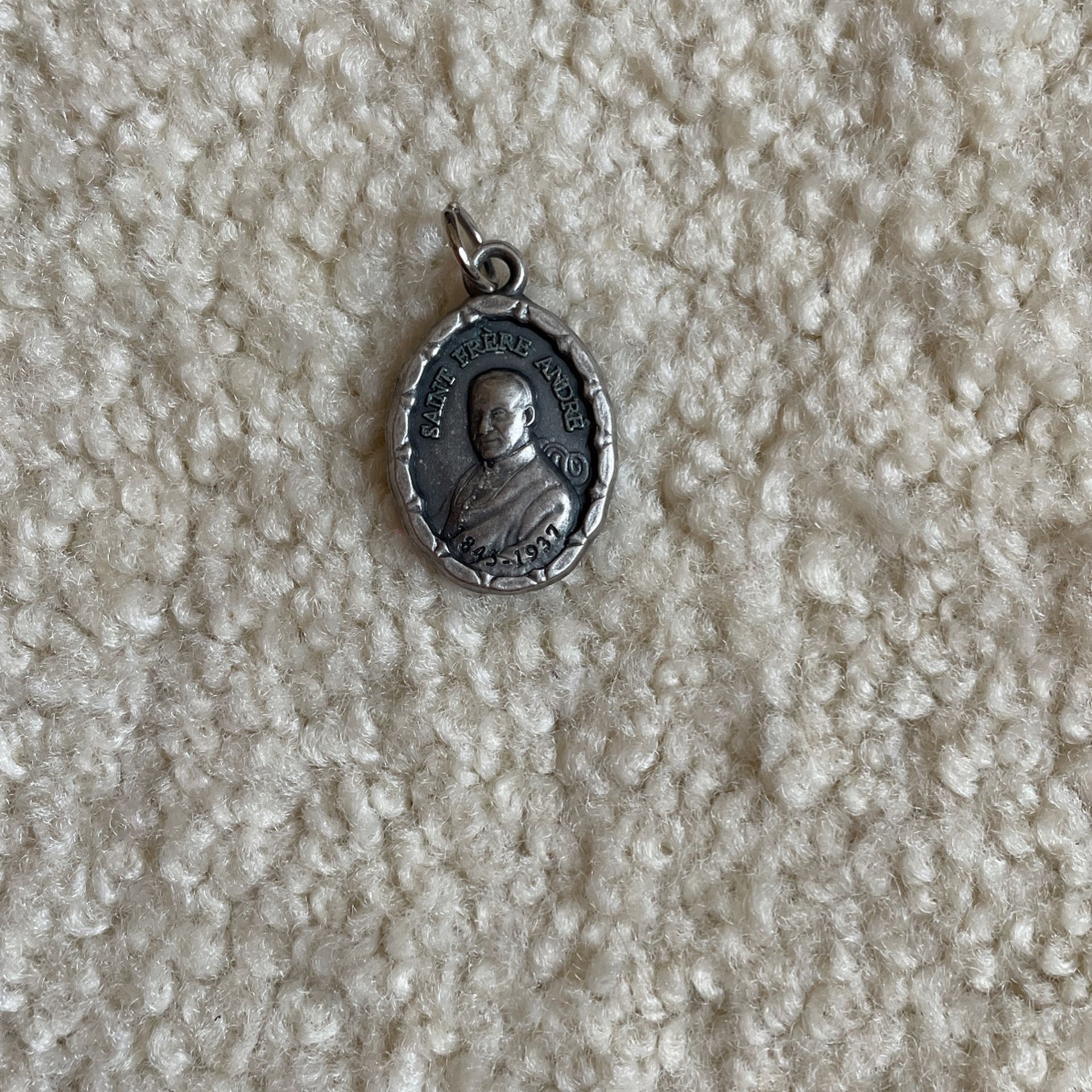 Medal Of Saint Brother André Silver Colored