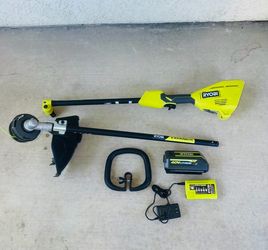 RYOBI 40V 15 in. Expand-It Cordless Battery Attachment Capable String Trimmer with 4.0 Ah Battery and Charger