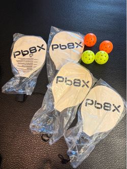 Brand New Pickleball 4 wood paddles and 4 balls.      Nike Adidas Patagonia scooter Yankees Mets Bikes Weights tennis Yoga Sneakers Chair Table mirror