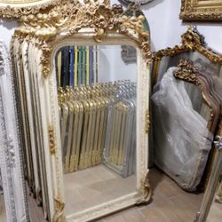 Curio Louis XV Mirror LOOK UP This is a French Louis XV style mirror with a cherub figural frame. TIME PERIOD 1 ORIGIN France ESTIMATED VALUE