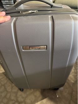 Delsey luggage-silver hard case