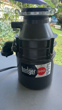 LIKE NEW InSinkErator Badger 500 garbage disposal featuring a 1/2 HP motor