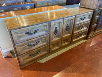 FIRST FAMILY FROM THE INDOOR WORLD OF ARMSTRONG Six Drawer and Two Door Buffet